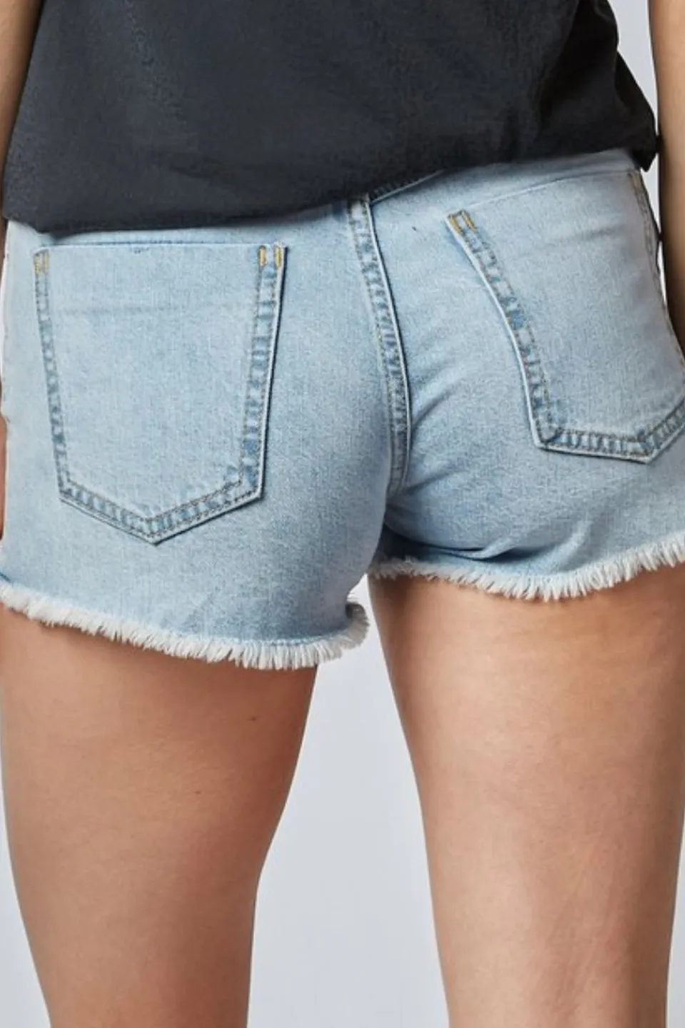 Felia High Rise Light Blue Raw Hem Denim Shorts